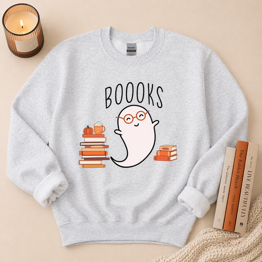 Gray sweatshirt with a ghost and book design labeled 'BOOOKS' on a beige background.