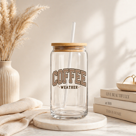 16 oz glass iced coffee cup with bamboo lid and glass straw featuring coffee weather design on neutral aesthetic background