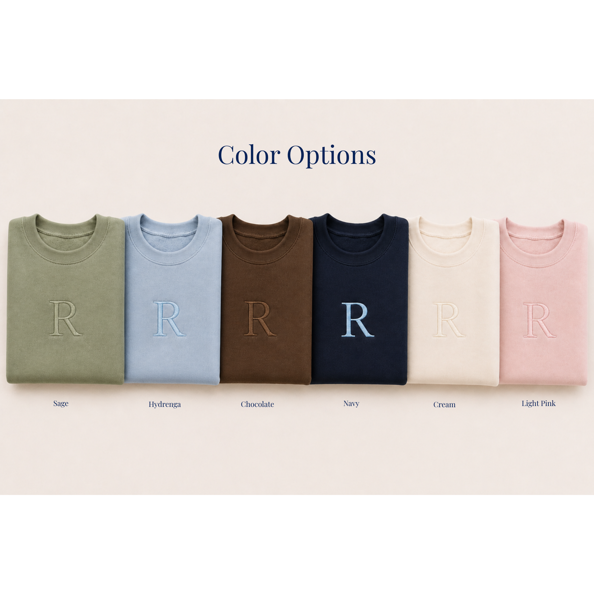 Row of folded shirts in various colors with 'R' logos on a beige background