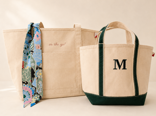 Large and small personalized canvas tote bags styled with a blue floral twilly scarf.